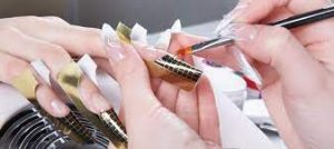 What are the main components of an acrylic nail kit