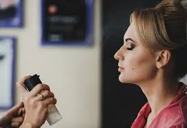 Do I apply the fixing spray before or after makeup