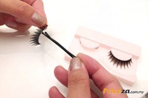 False eyelashes attached with glue